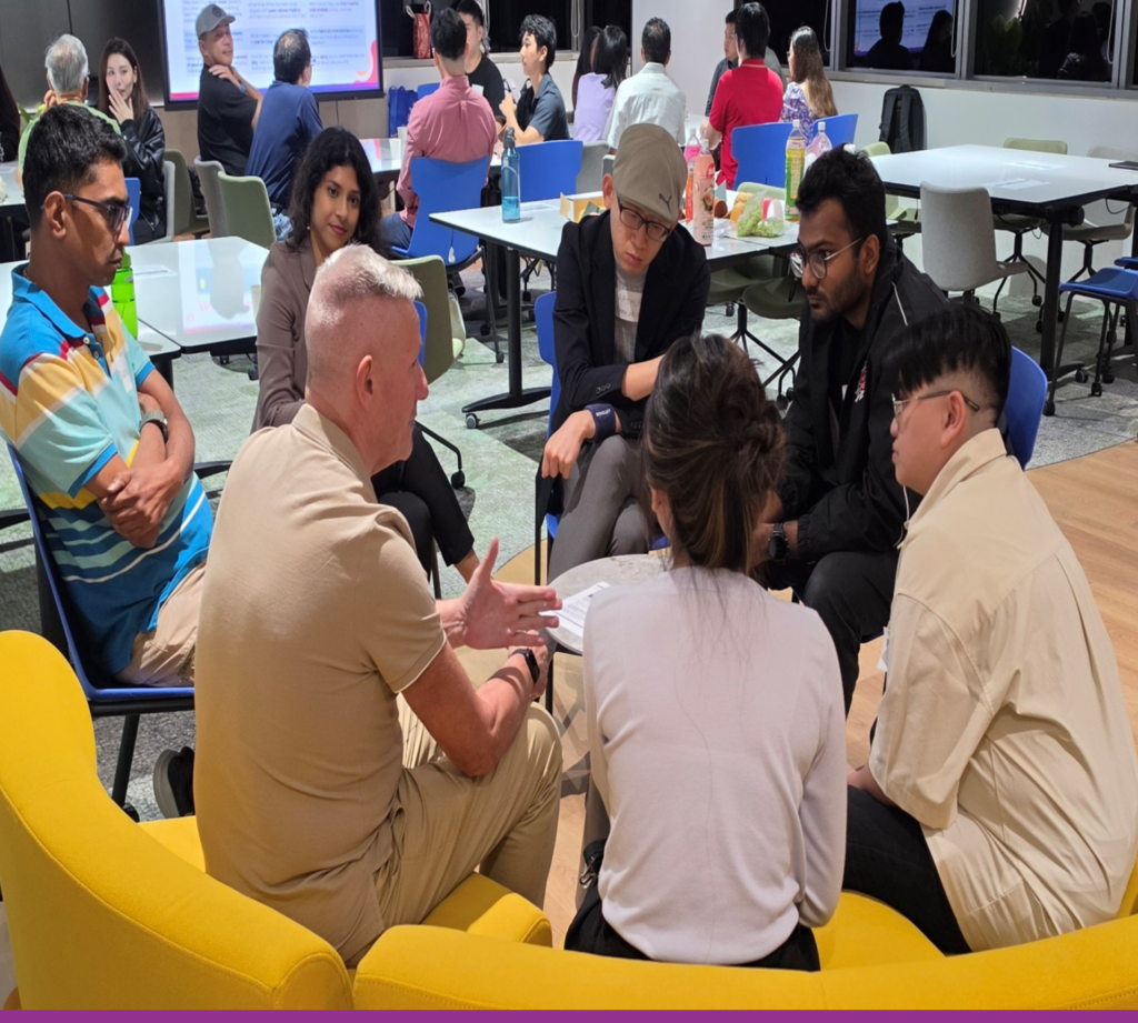 YMCA volunteers in a huddle