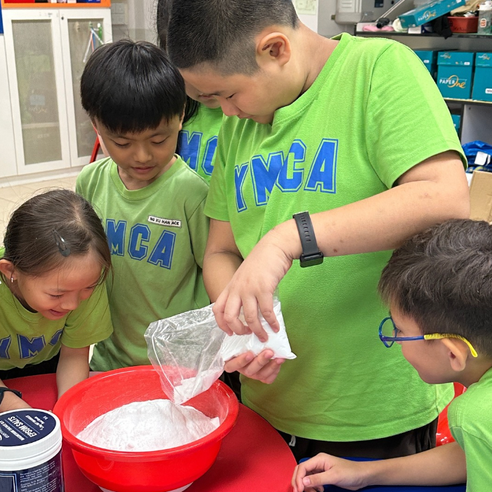 Children taking part in a YMCA educational activity.